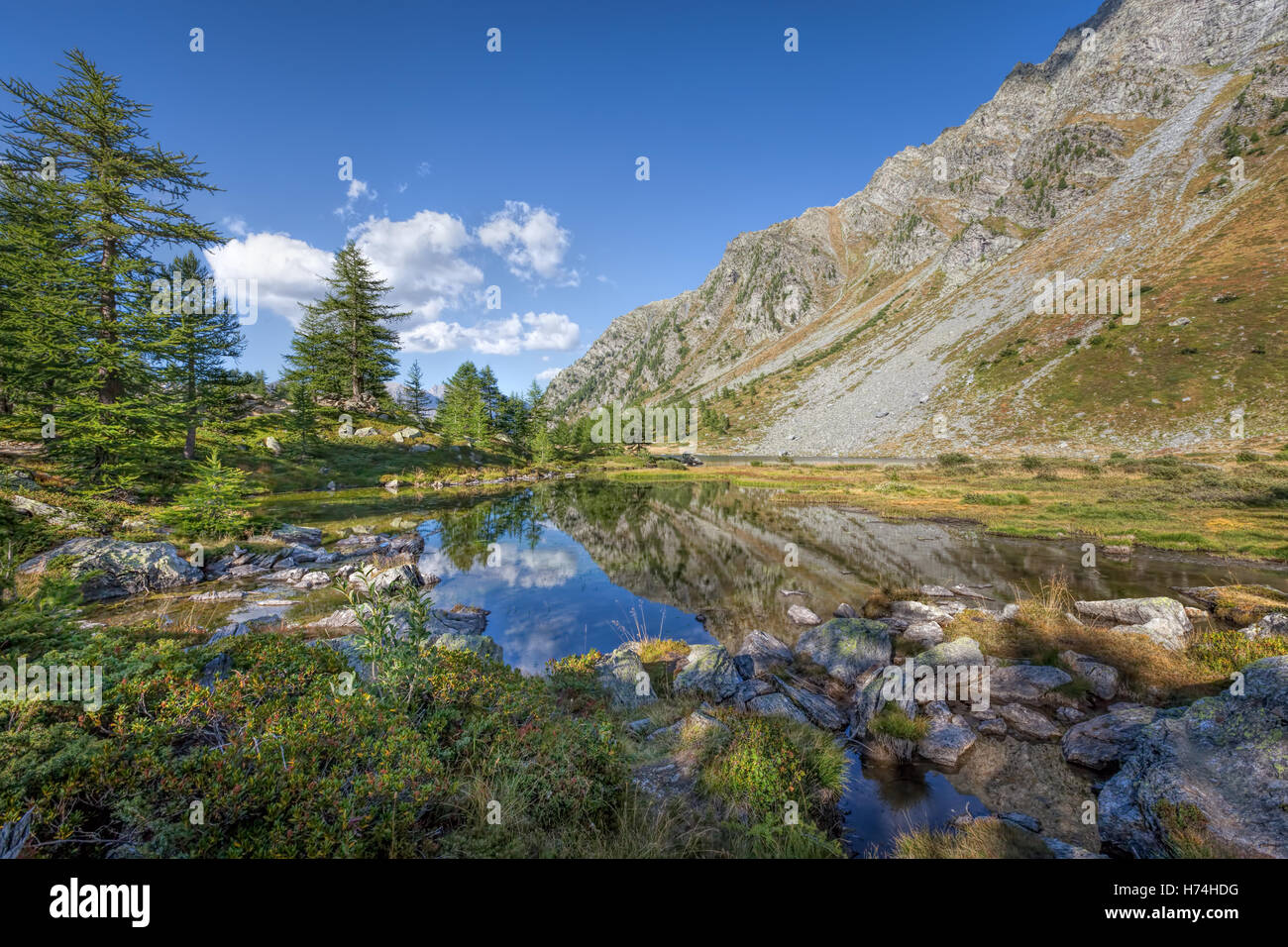 Lake Arpy with reflections - Lago d'Arpy, Aosta Valley, Italian Alps Stock Photo