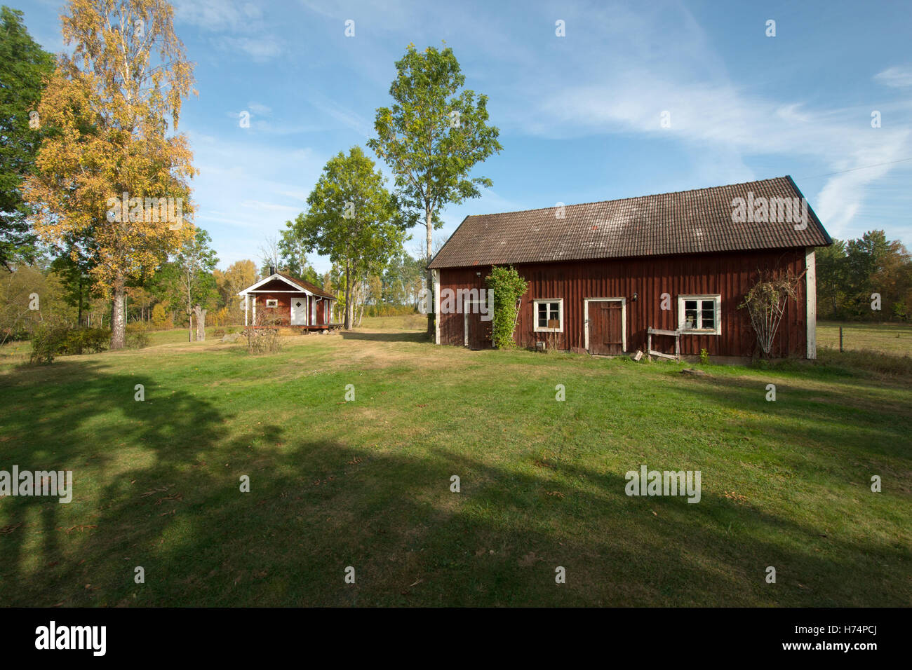 typical red wooden house in smaland near Ramkvilla south of sweden