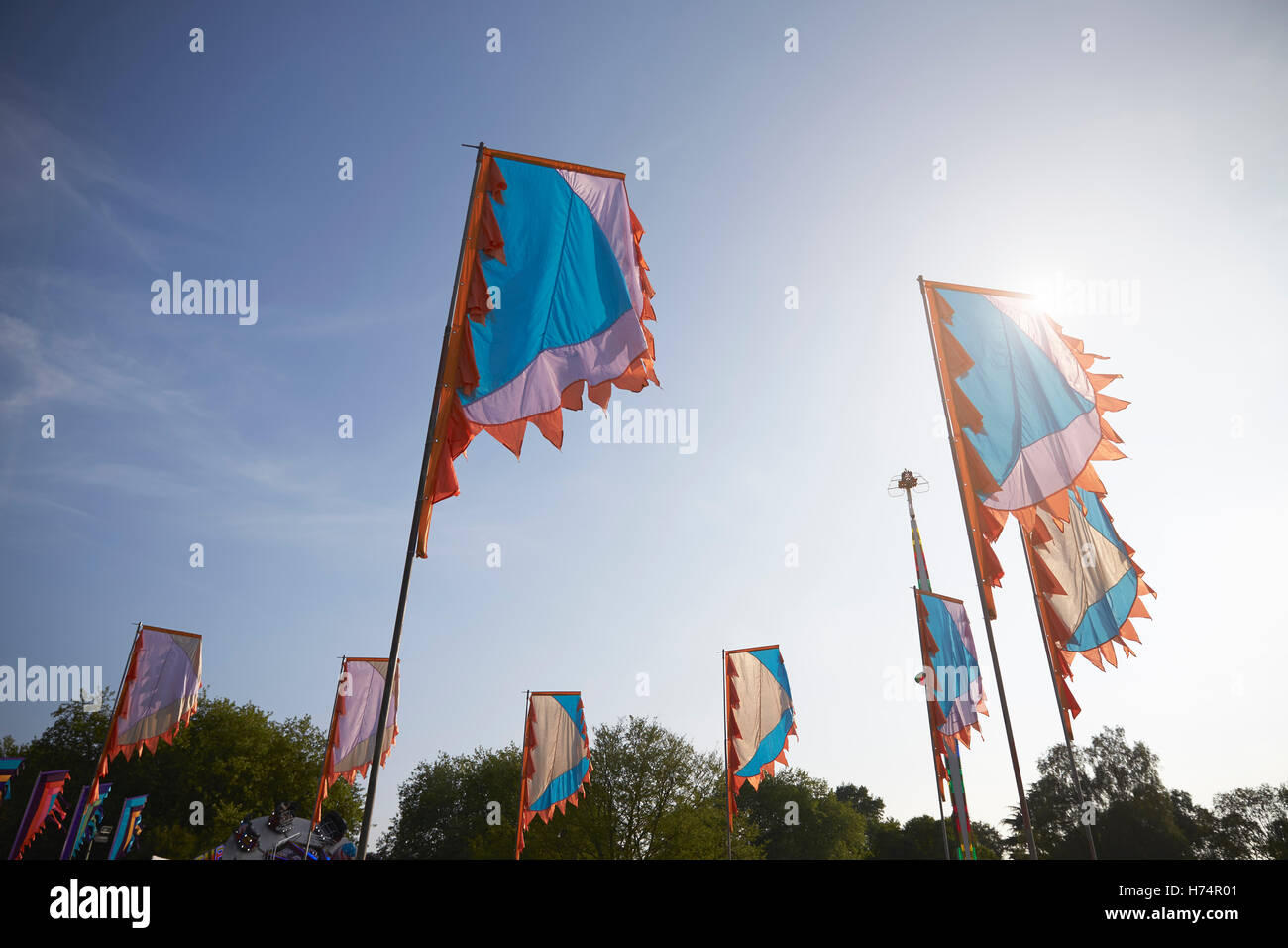 Flags Flying At Outdoor Music Festival Stock Photo