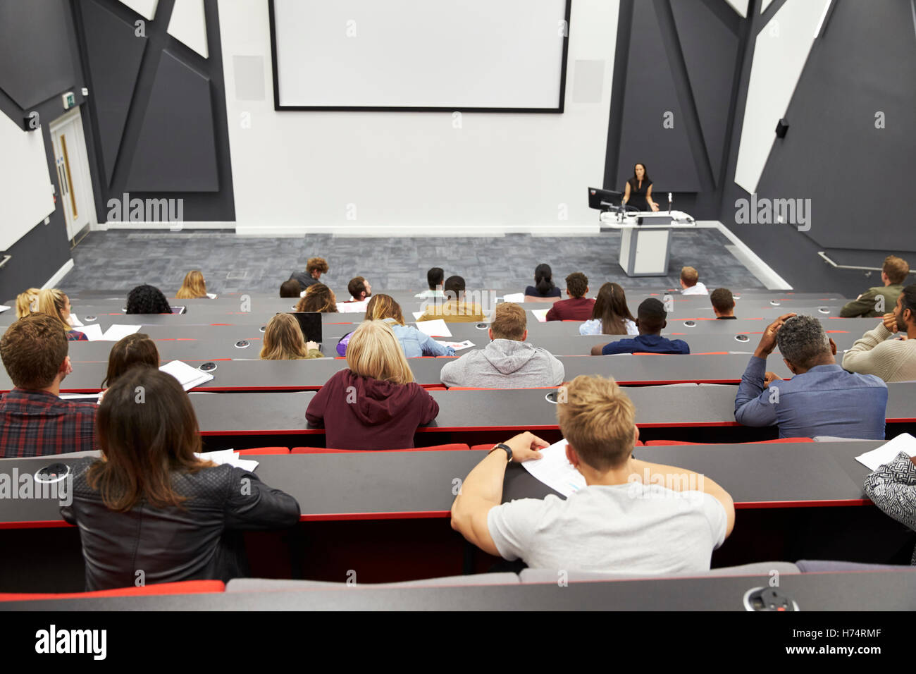 Lecture at university lecture theatre, audience POV Stock Photo