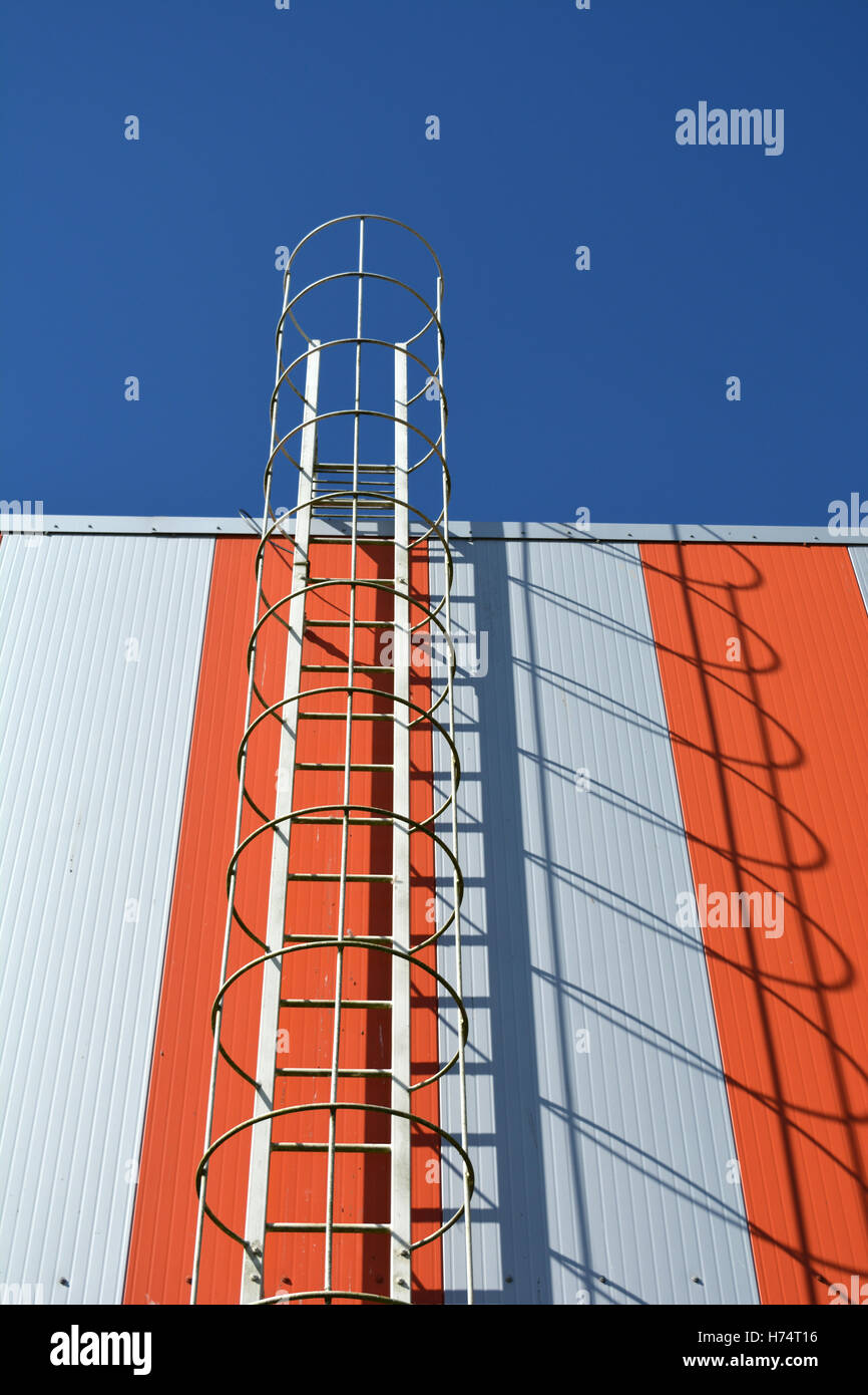 modern industrial building wall with metal ladder, stairs and sky Stock Photo Alamy