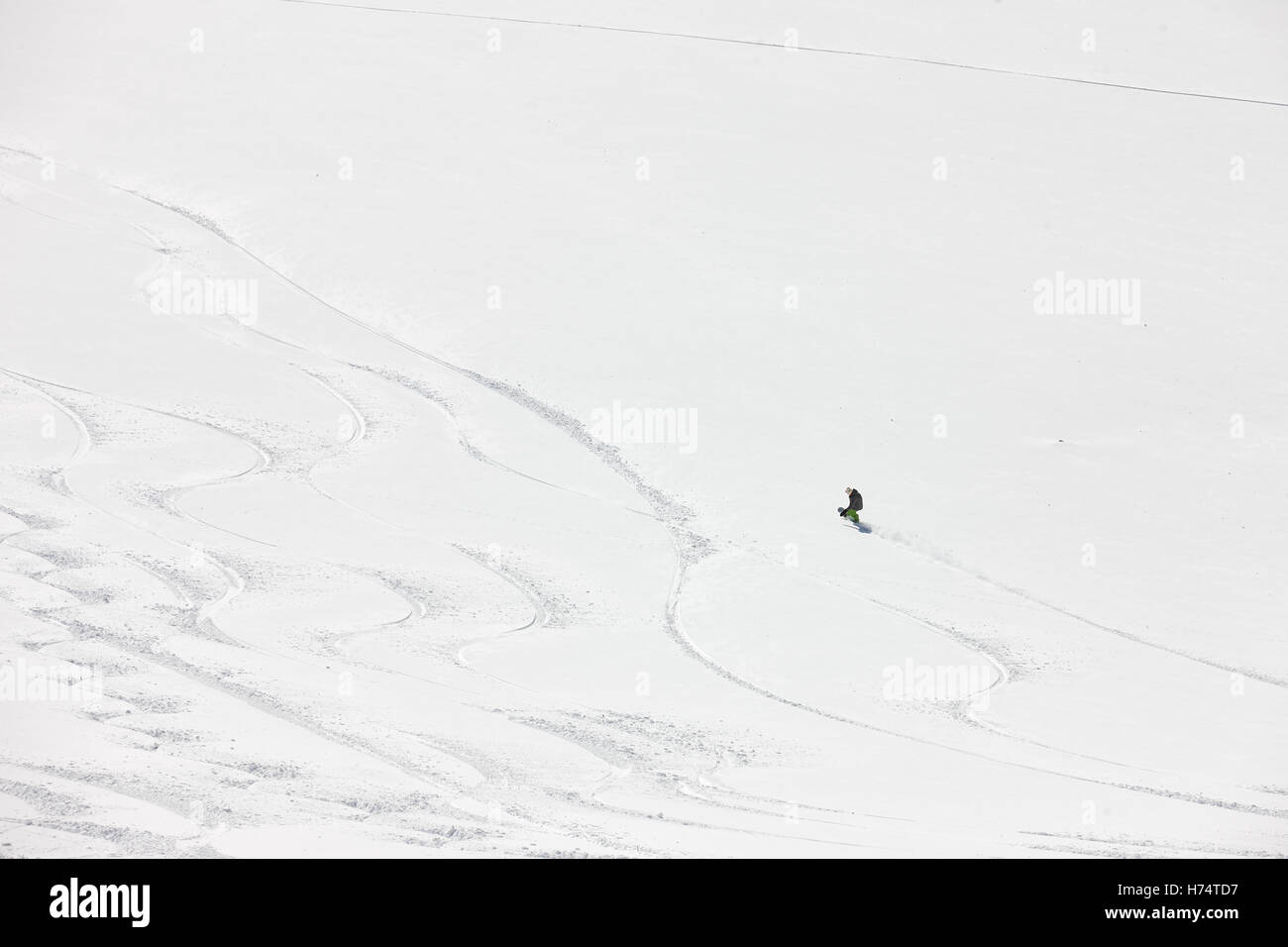 Snowboard freeriding in Alps Stock Photo