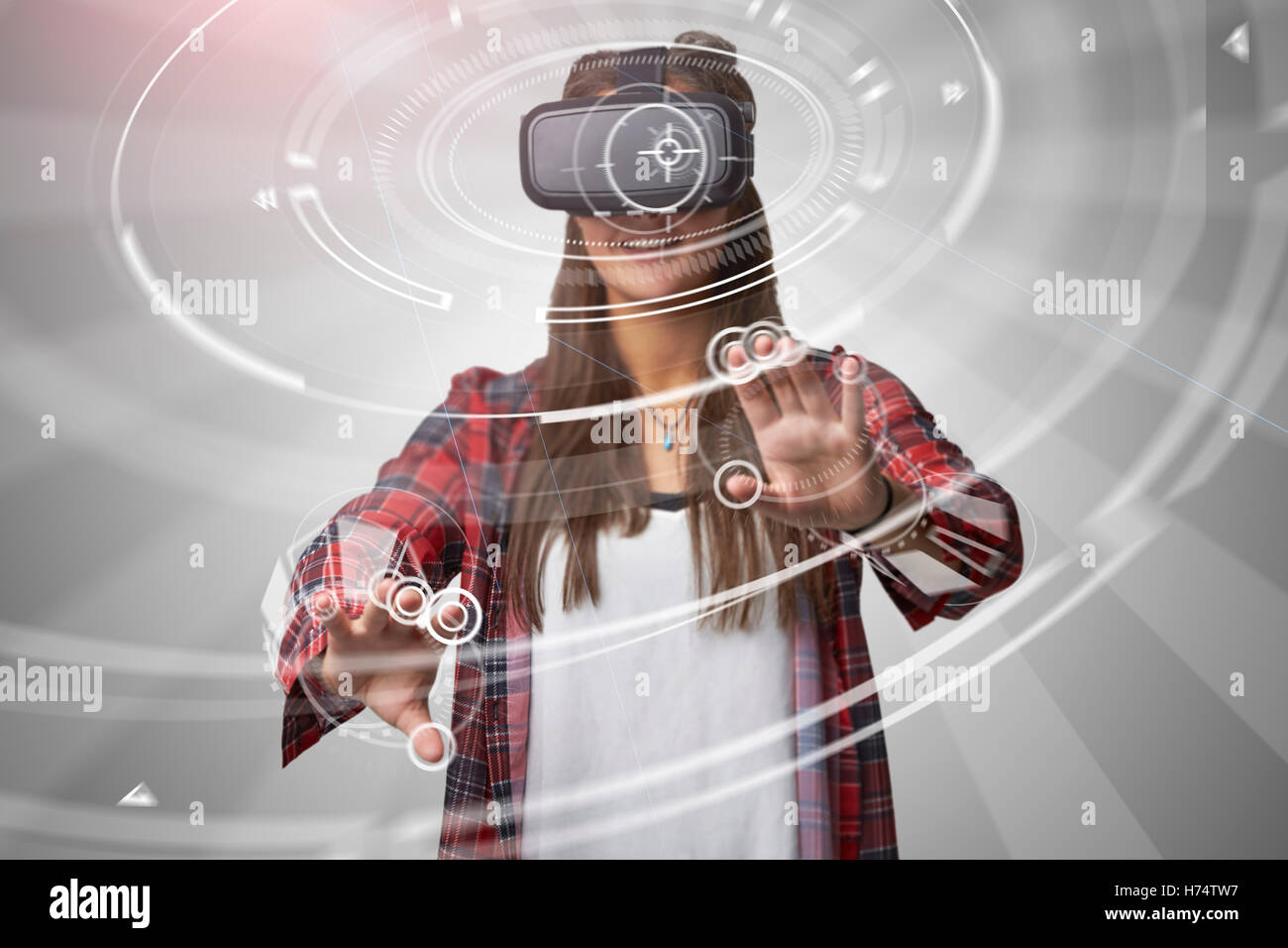 Woman Using Virtual Reality Headset Stock Photo - Alamy
