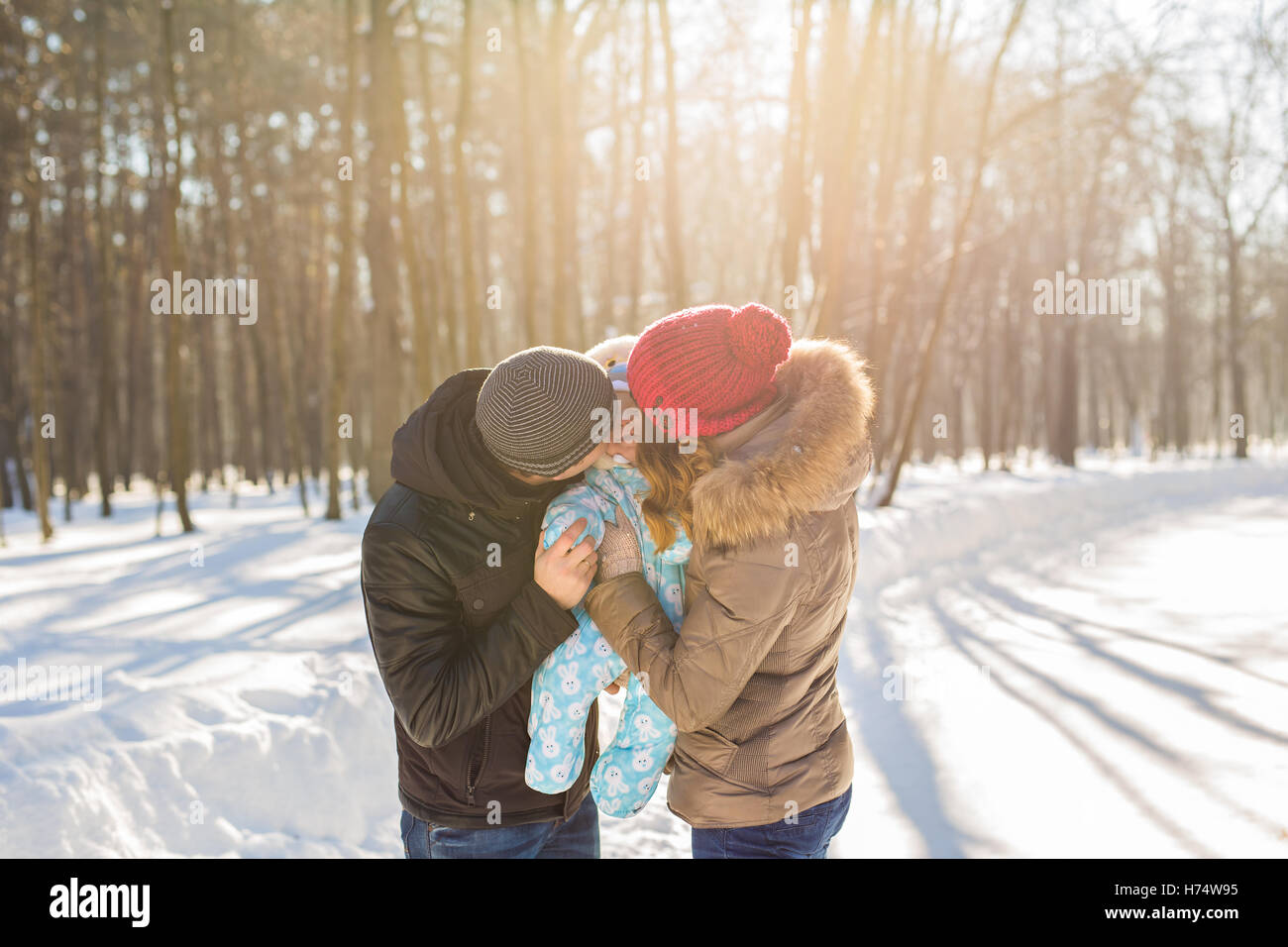 family outdoors in winter landscape Stock Photo - Alamy