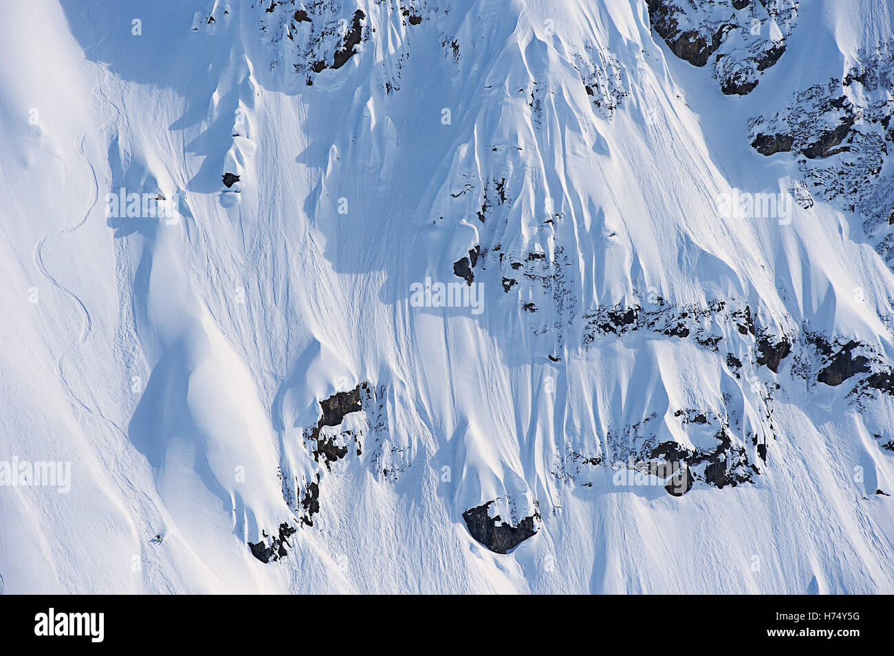 A skier skis a line in Haines, Alaska. Stock Photo