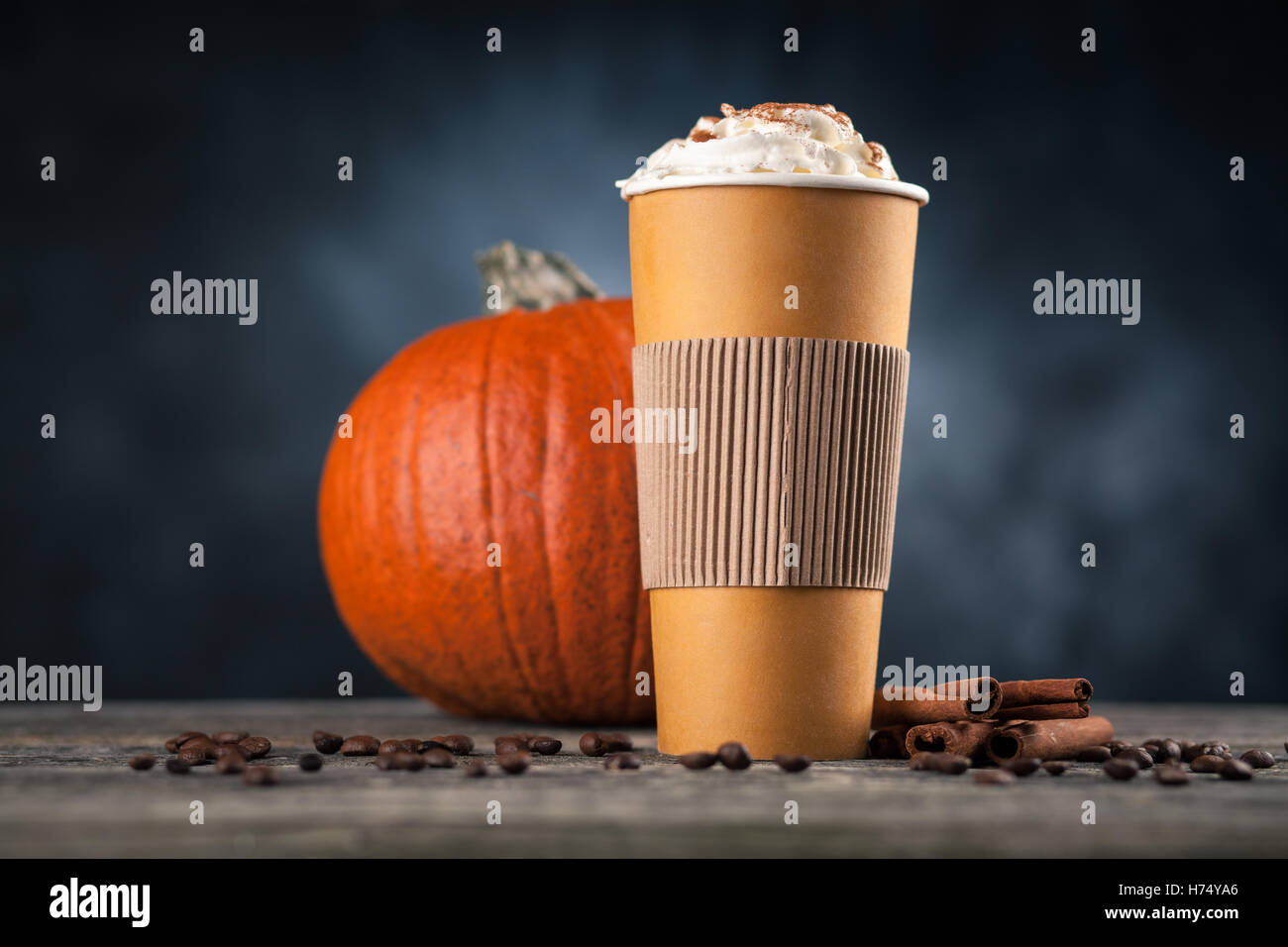 Pumpkin spice latte in a paper cup Stock Photo - Alamy