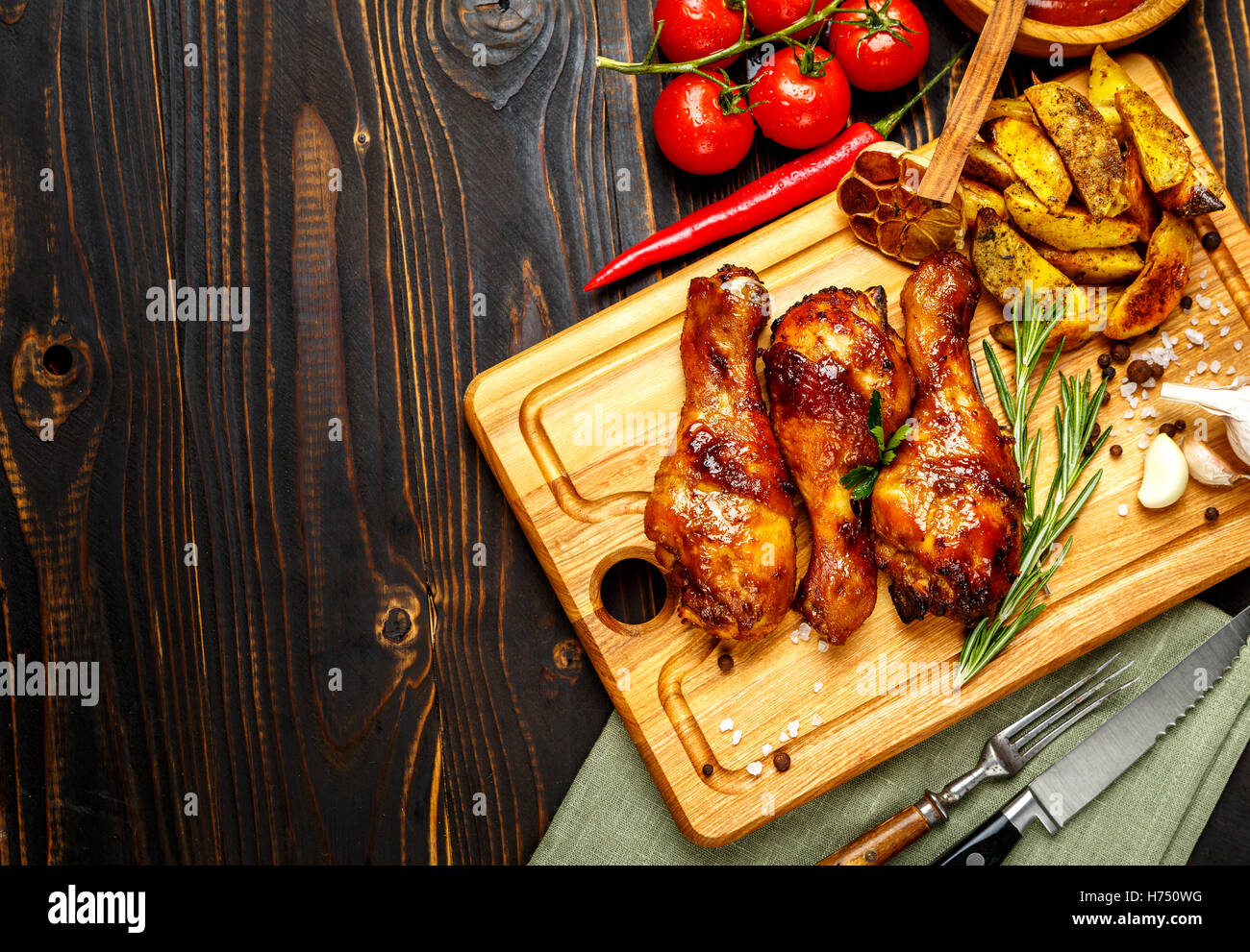 roasted chicken legs with herbs Stock Photo Alamy