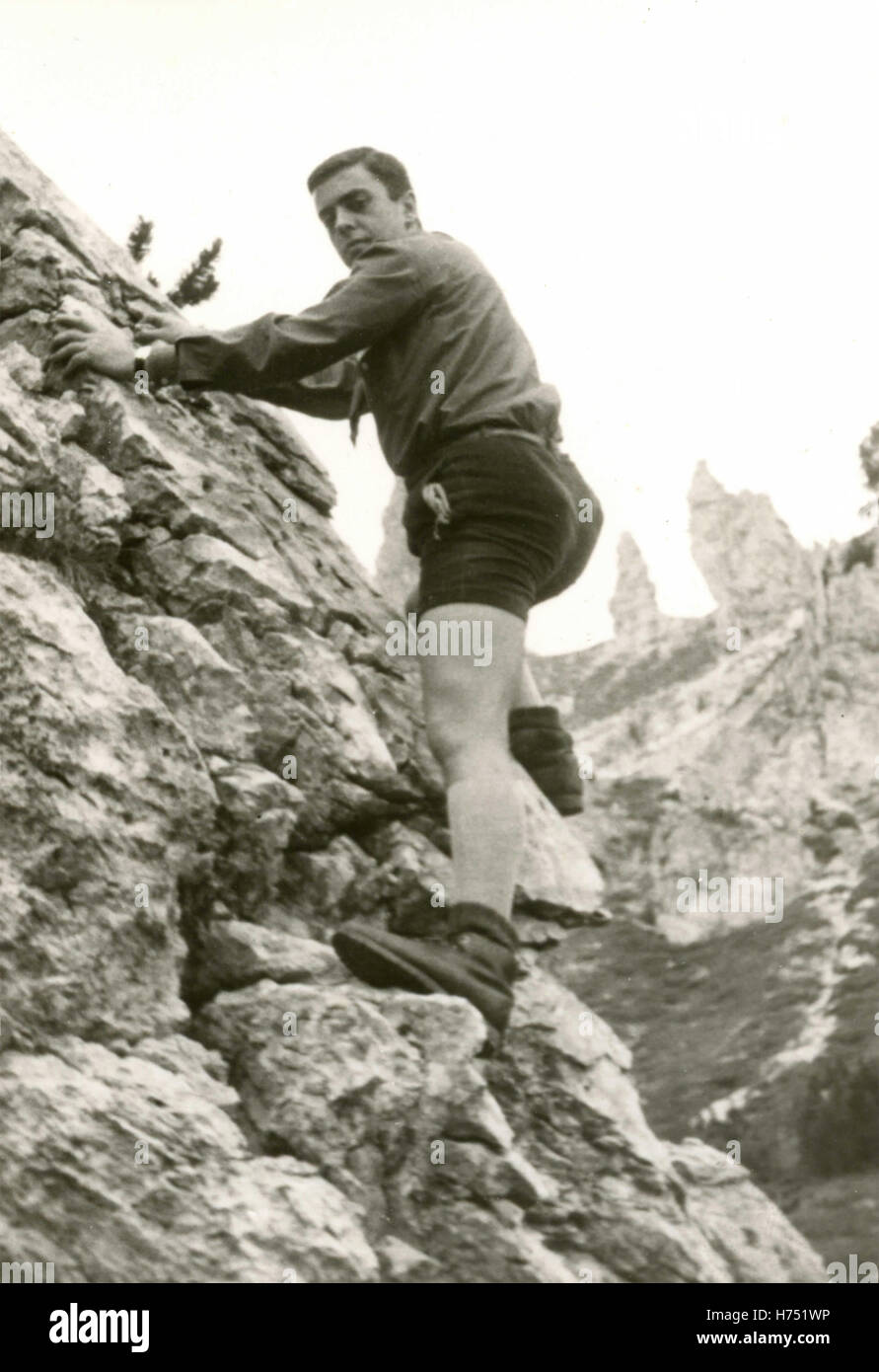 Man free climbing, Valdagno, Italy Stock Photo