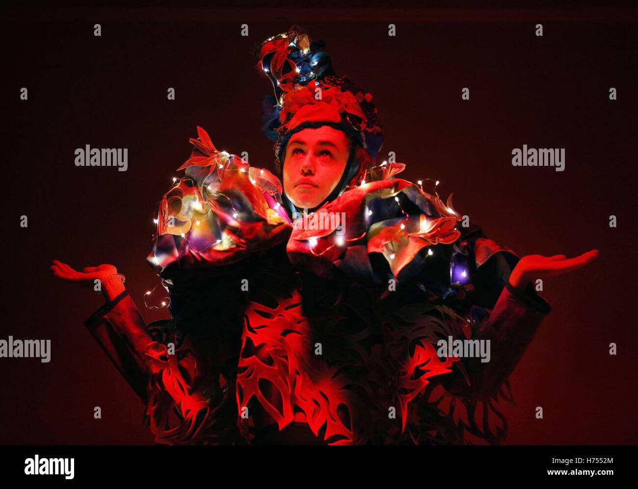 University of Edinburgh students wear outfits adorned with lights, mirrors and bells to mark the Indian Festival of Diwali in Edinburgh. Stock Photo