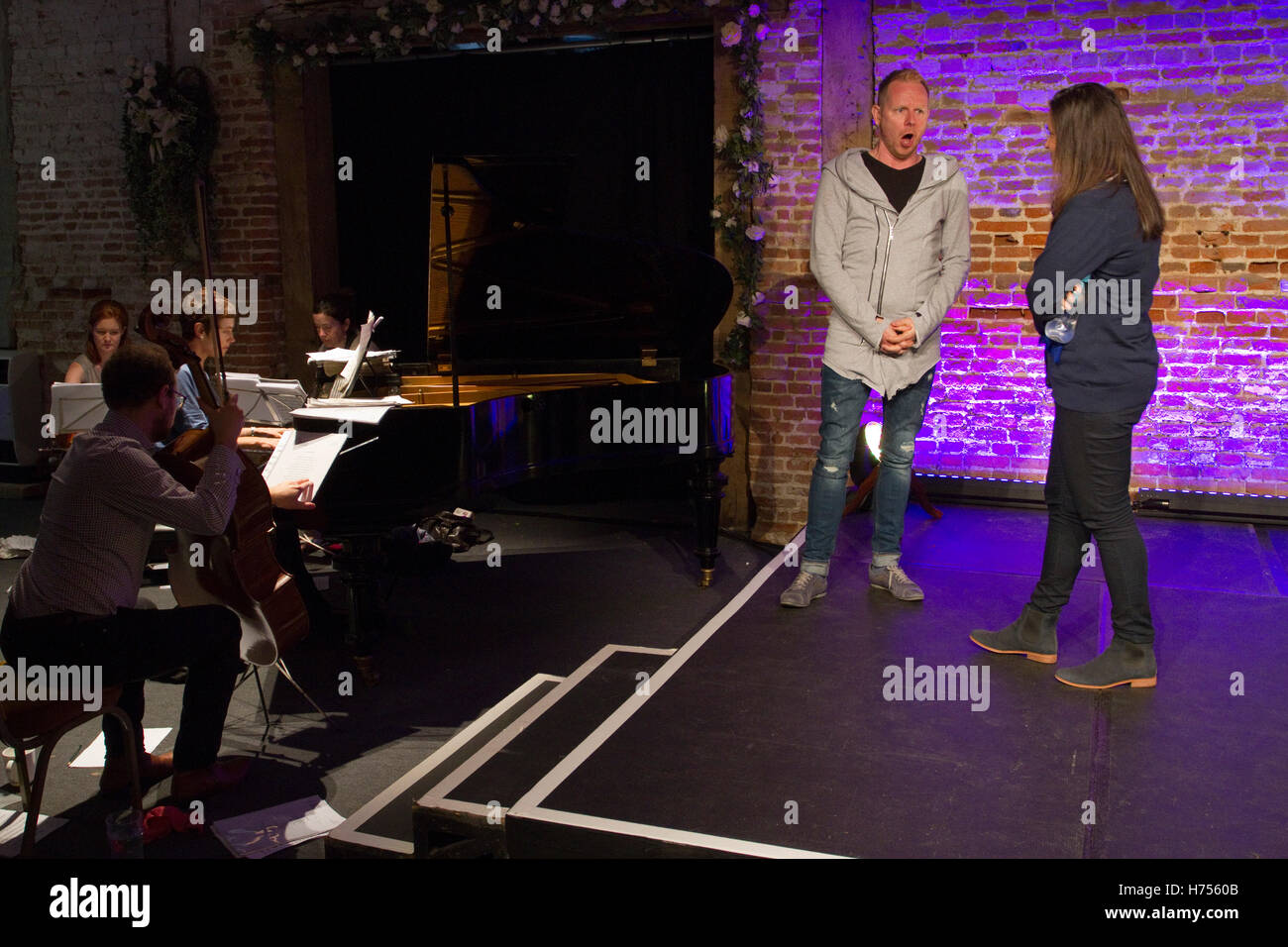 Opera singers rehearsing before a charity event Stock Photo