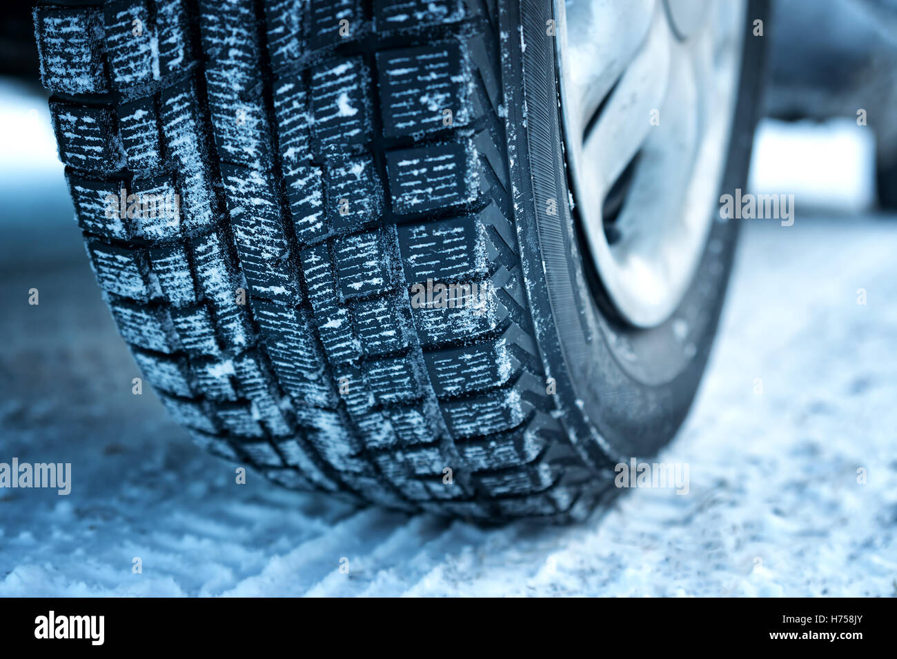 Closeup of car tires in winter Stock Photo Alamy