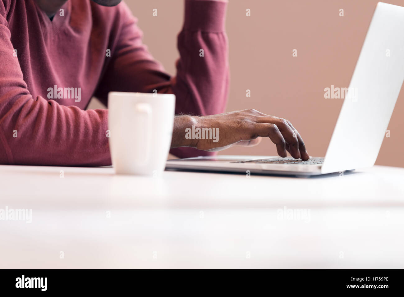 Close up african hands typing hi-res stock photography and images - Alamy