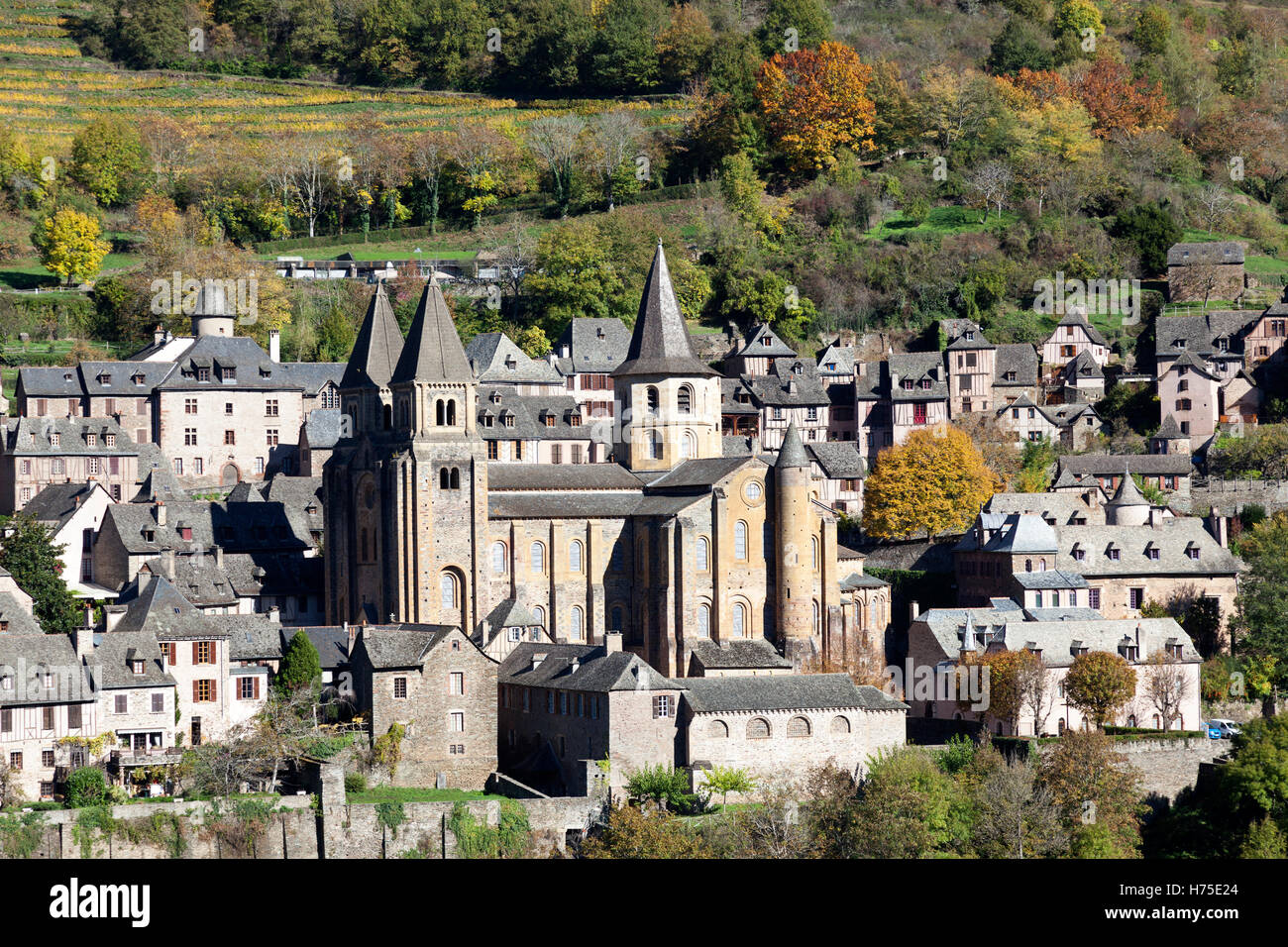 By an Autumnal morning, an overview on the village of Conques from the vantage point known as 'Bancarel' (Aveyron - France). Stock Photo
