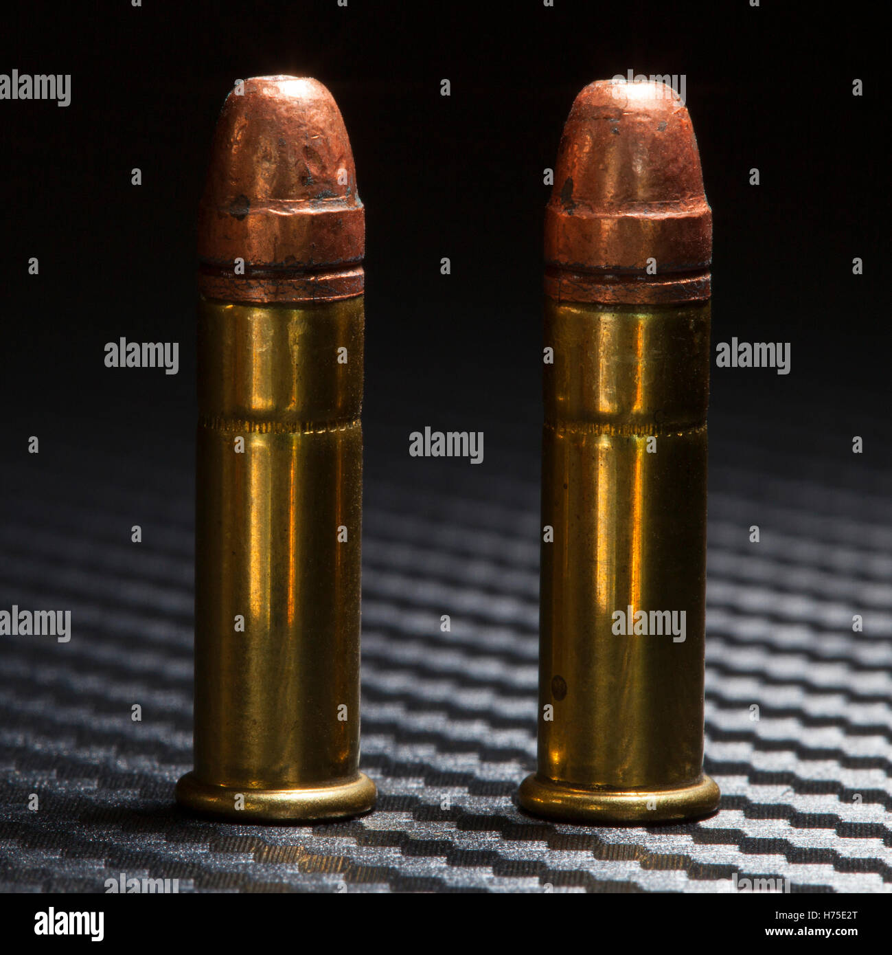 Cartridges with copper bullets used in rimfire firearms Stock Photo