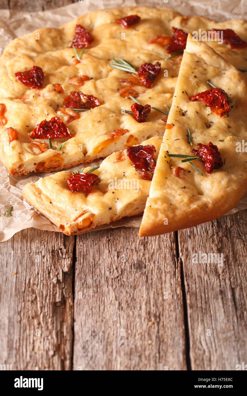 Sliced bread Italian focaccia with sundried tomatoes and rosemary