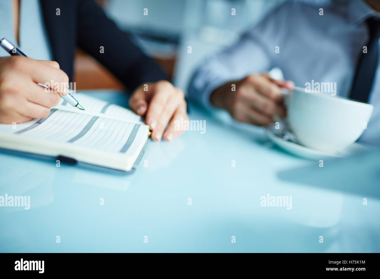 Writing plan of working day Stock Photo - Alamy