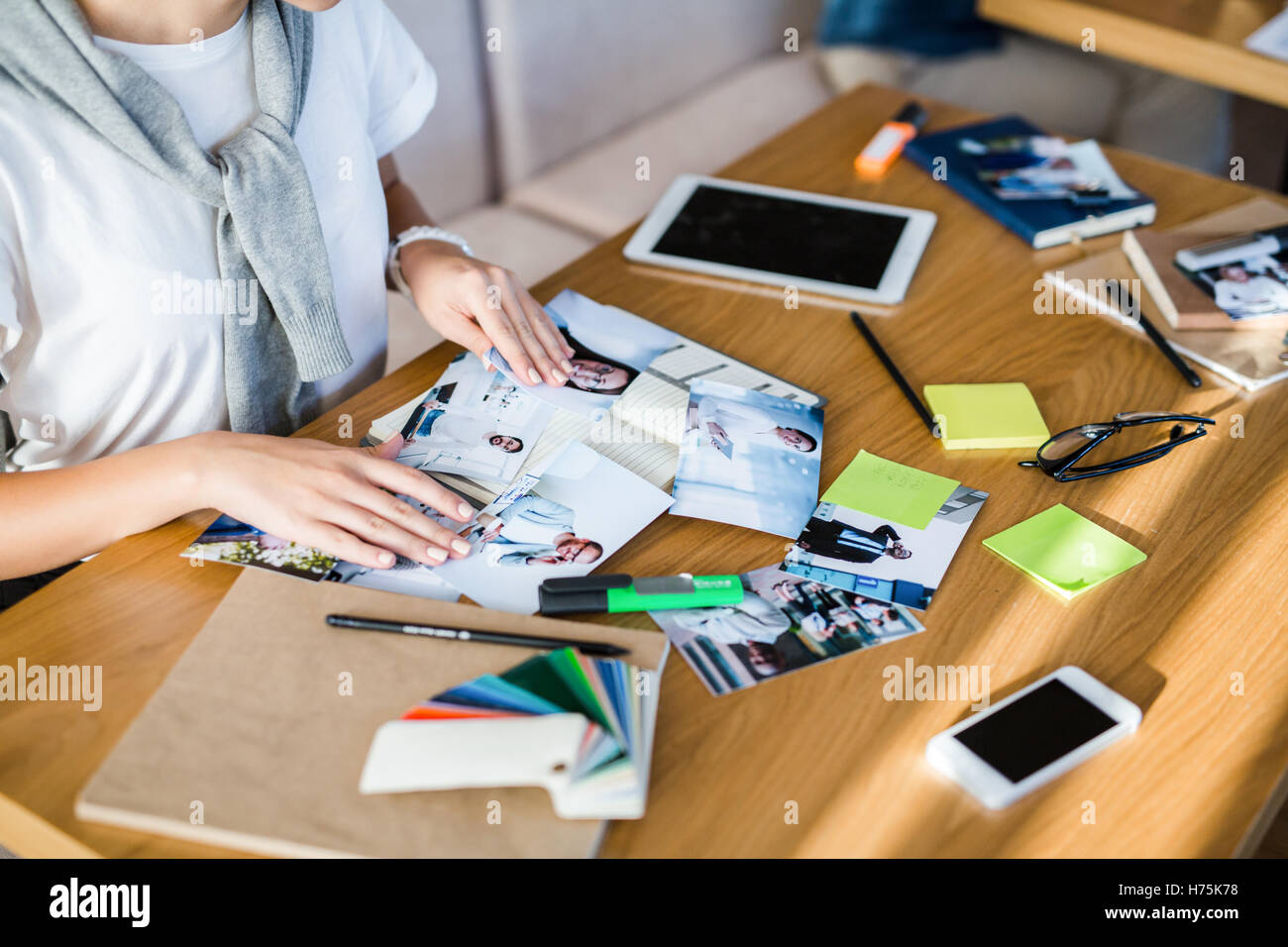 Working with photos Stock Photo - Alamy