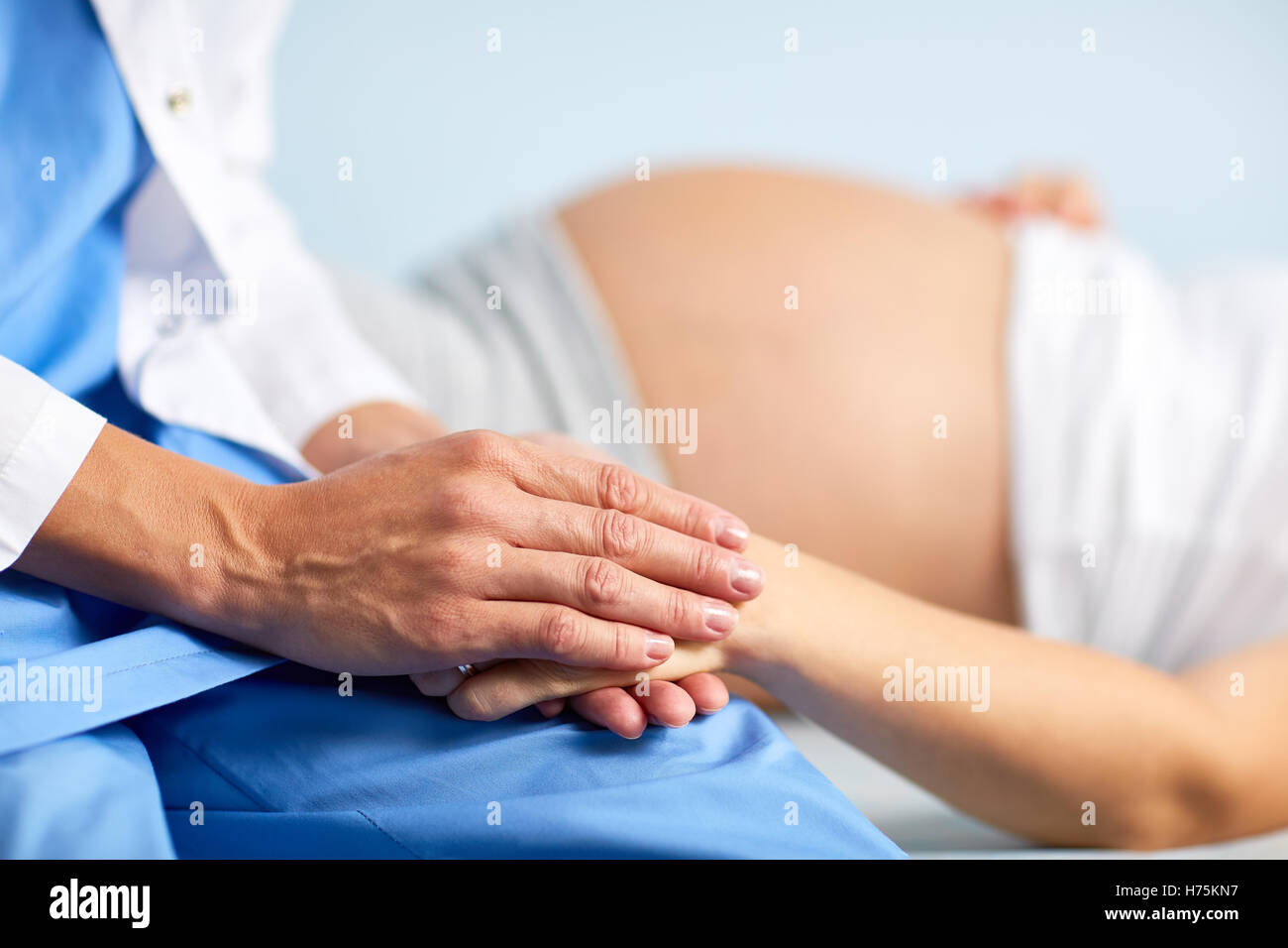 Pray for the pregnant Stock Photo
