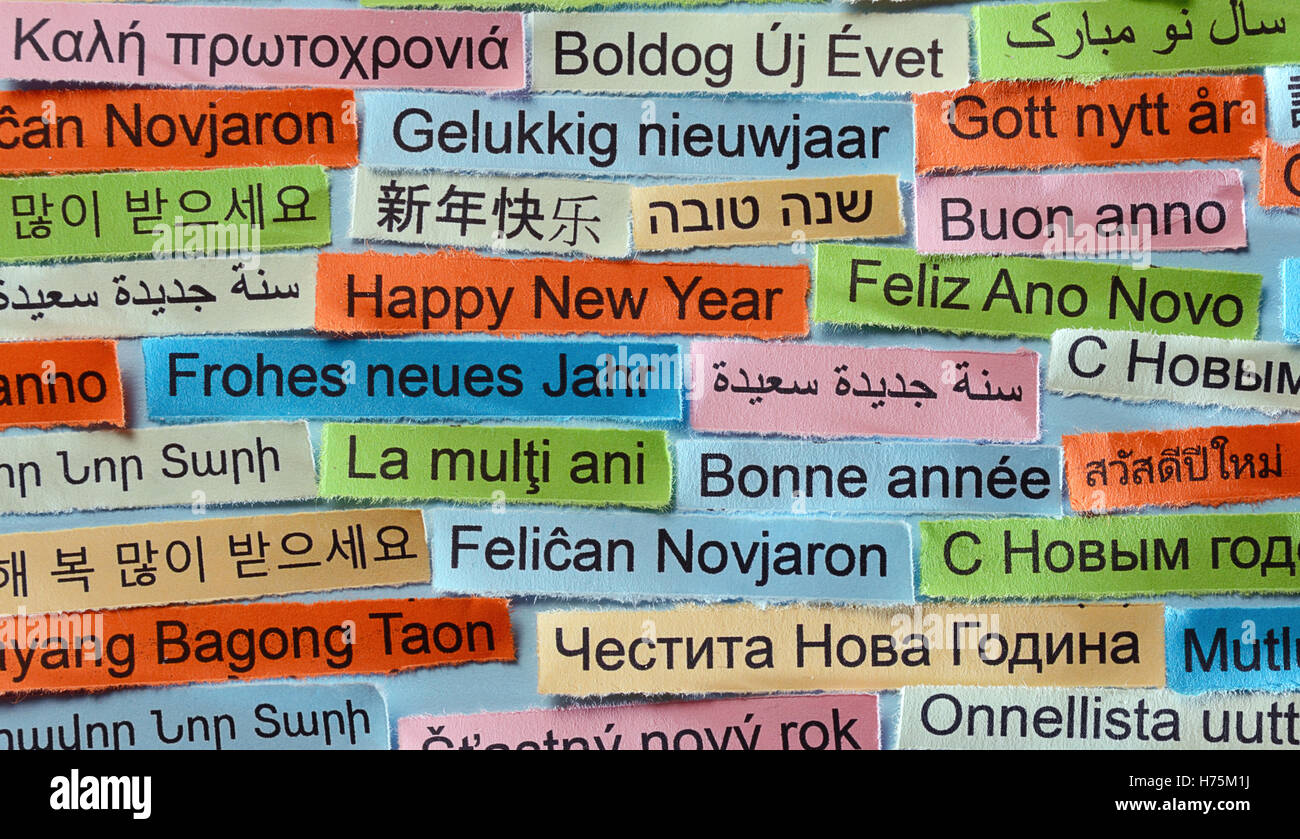 Happy New Year Word Cloud printed on colorful paper different languages Stock Photo