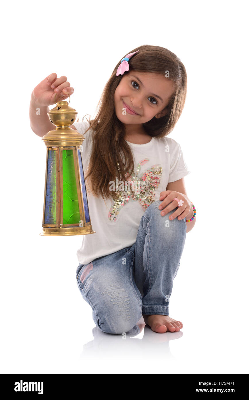 Smiling Young Girl with Ramadan Lantern Isolated on White Background Stock Photo