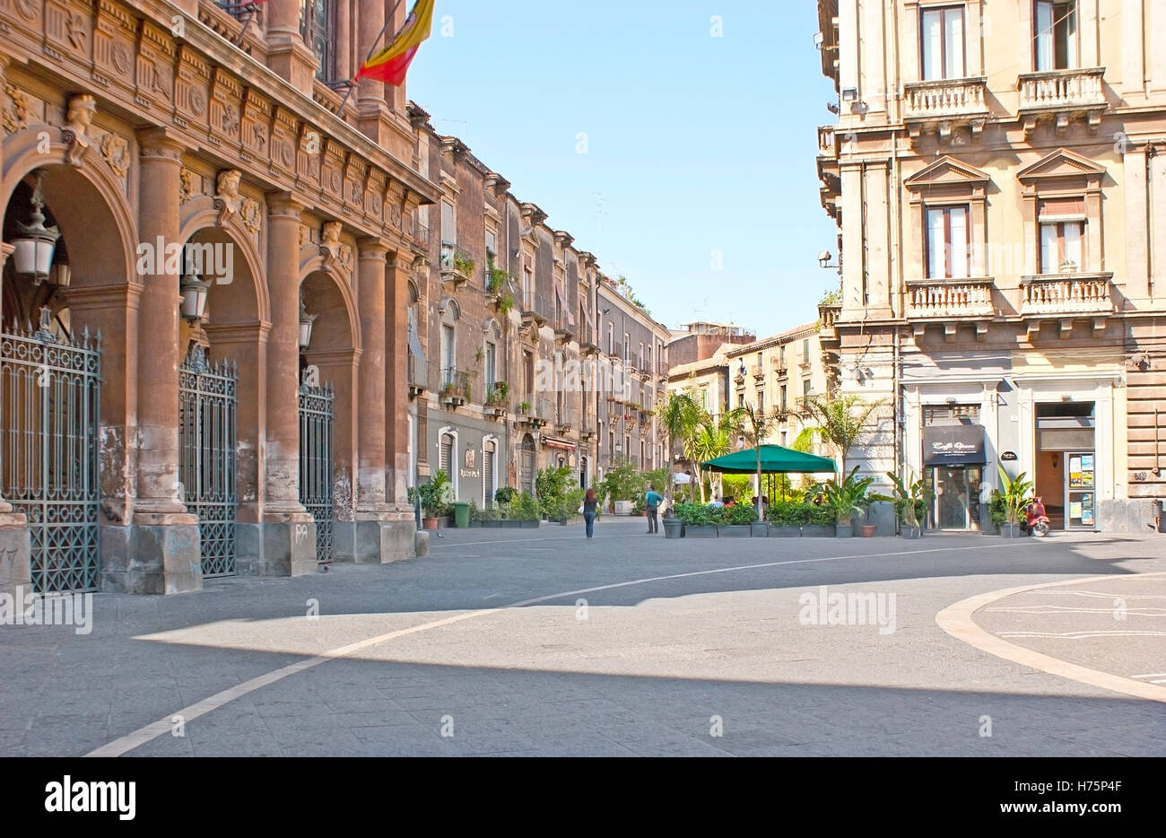 The Square of Vincenzo Bellini is occupied with the Opera House and overlooks the old streets of the city Stock Photo