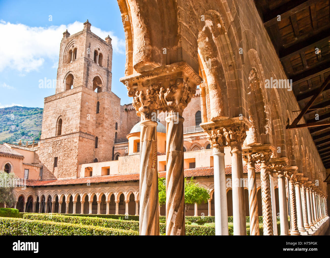 the courtyard and belltower of Monreale cathedral of Assumption of the Virgin Mary, Sicily Stock Photo