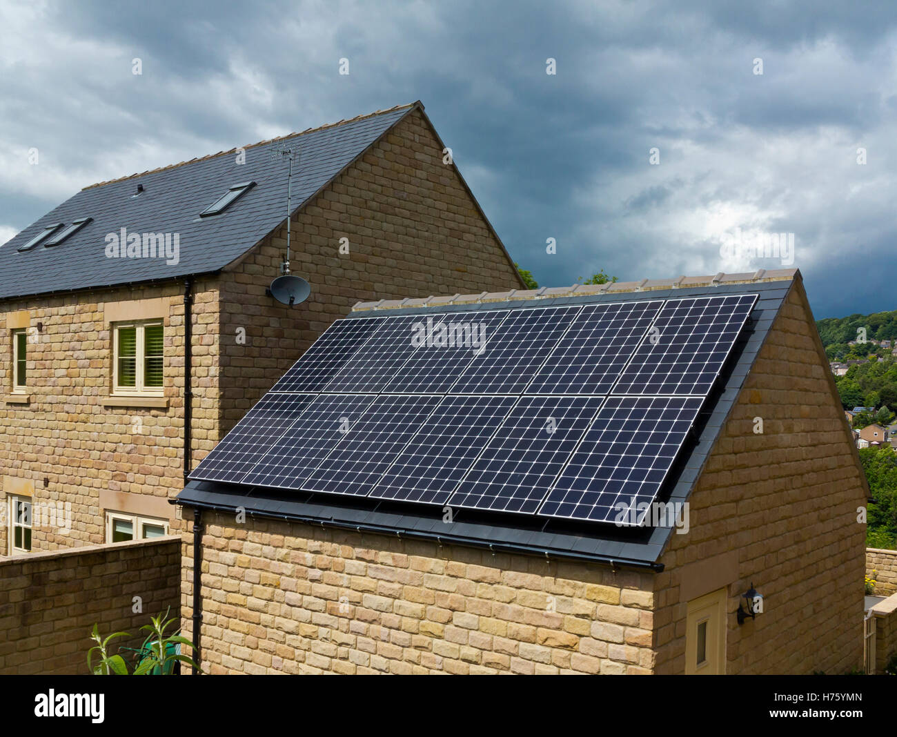 Solar panels on roof of newly built house in Derbyshire England UK Stock Photo