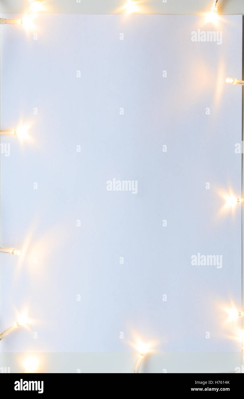 Christmas lights on gray table Stock Photo Alamy