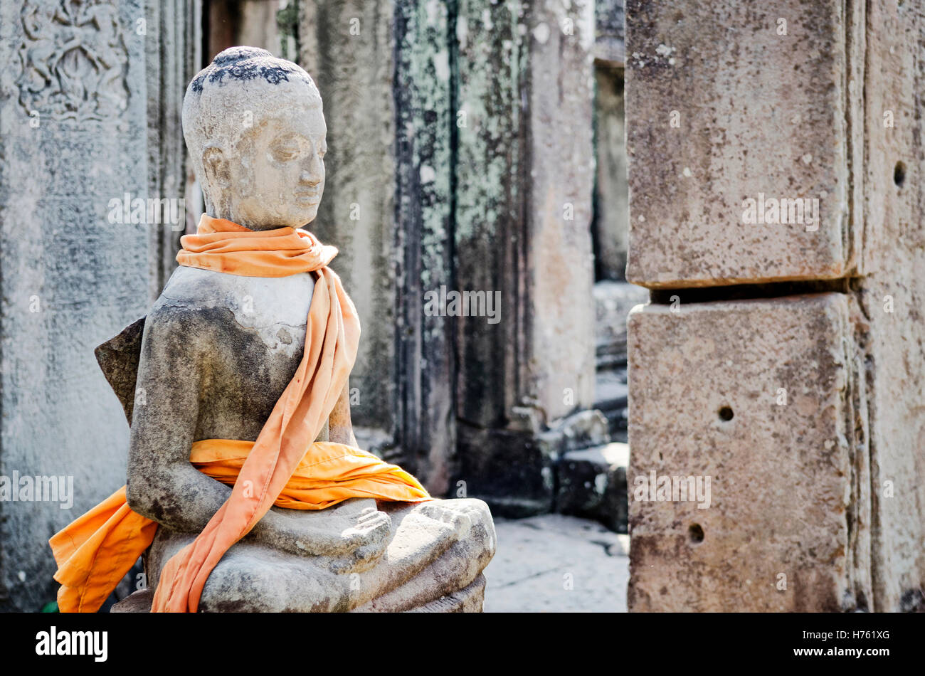 cambodian ancient buddha statue in famous landmark angkor wat temple