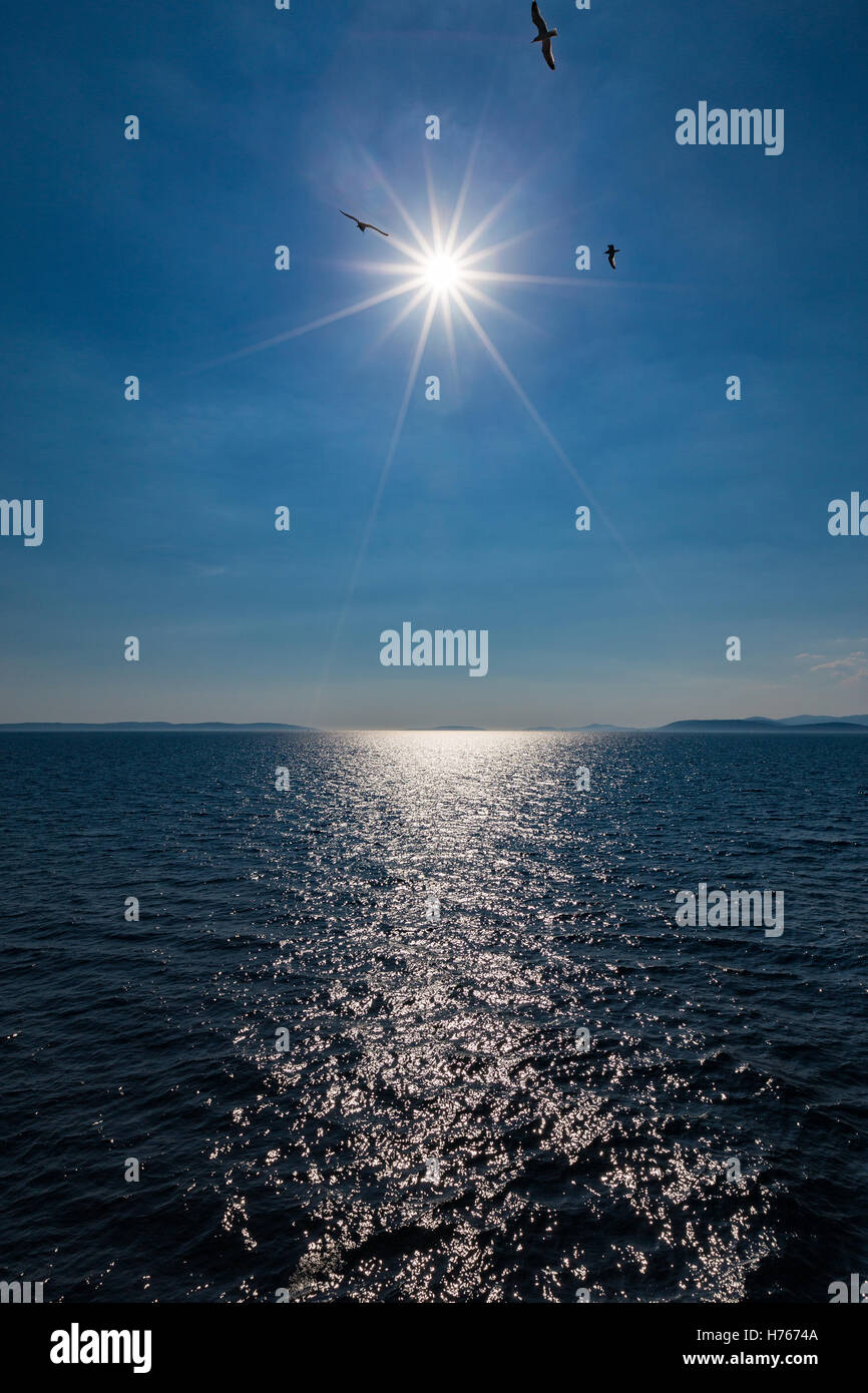 Sun, backlight, Adriatic sea. Stock Photo