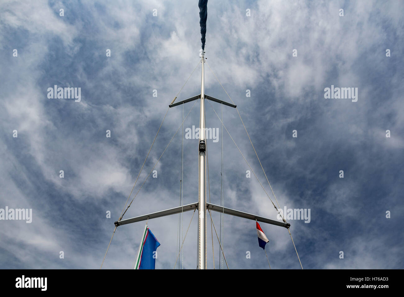 Mast and Sail on a sailing boat against sky, Lefkada, greece Stock Photo