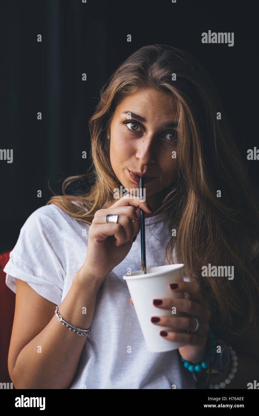 Drinking through straw hires stock photography and images Alamy