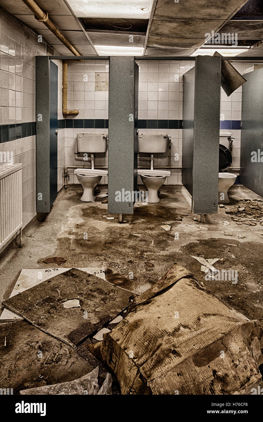Abandoned high school toilets, urban exploration, hdr Stock Photo