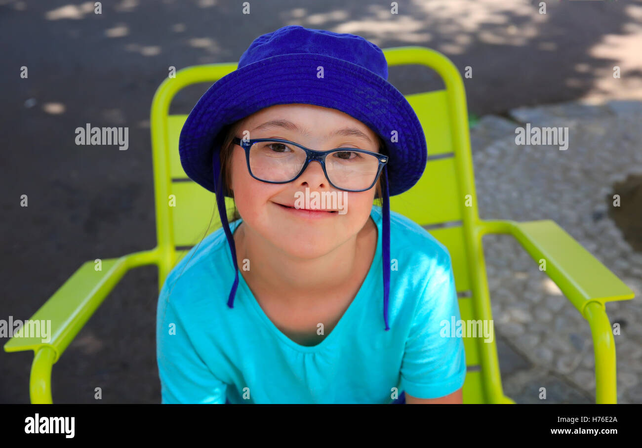 Little girl smiling outside Stock Photo - Alamy