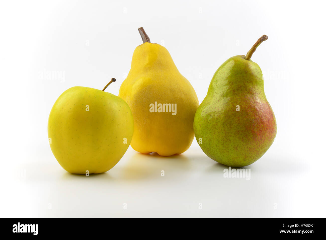 ripe pears and apple on white background Stock Photo Alamy