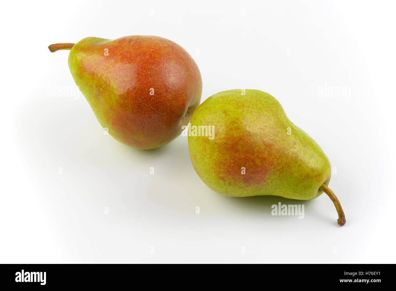 two ripe pears on white background Stock Photo - Alamy