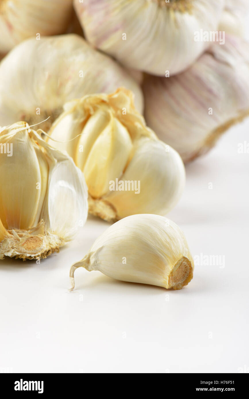 close up of garlic bulbs and cloves on white background Stock Photo - Alamy