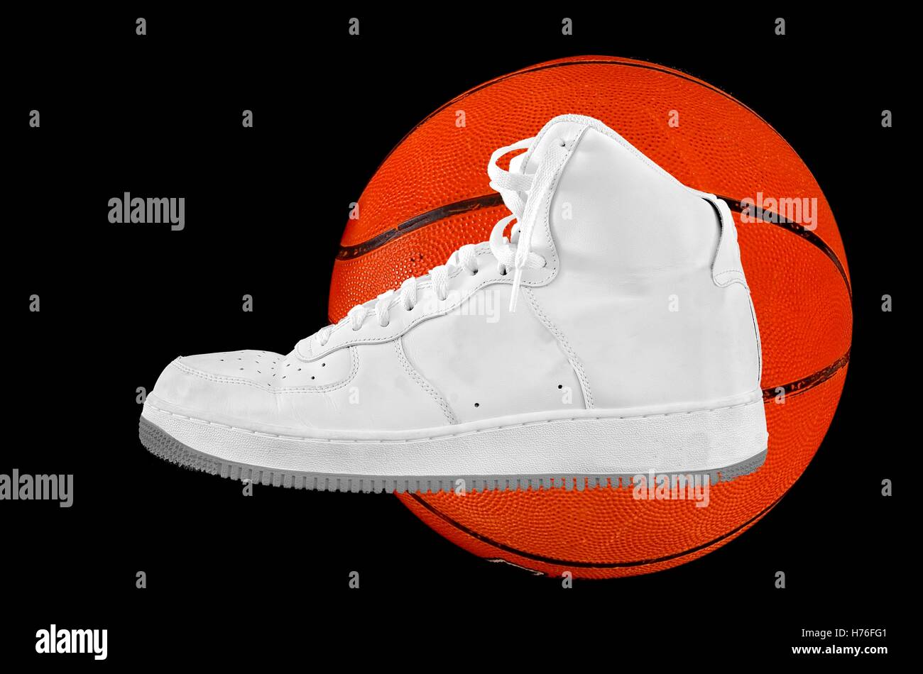 A hightop classic white leather basketball shoe sneaker with a