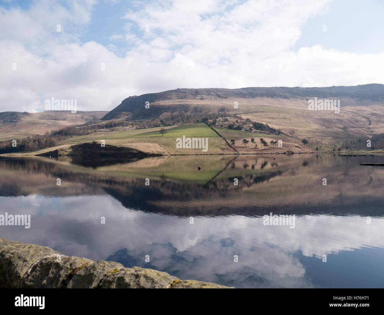 Reflections of moorland in reservoir Stock Photo