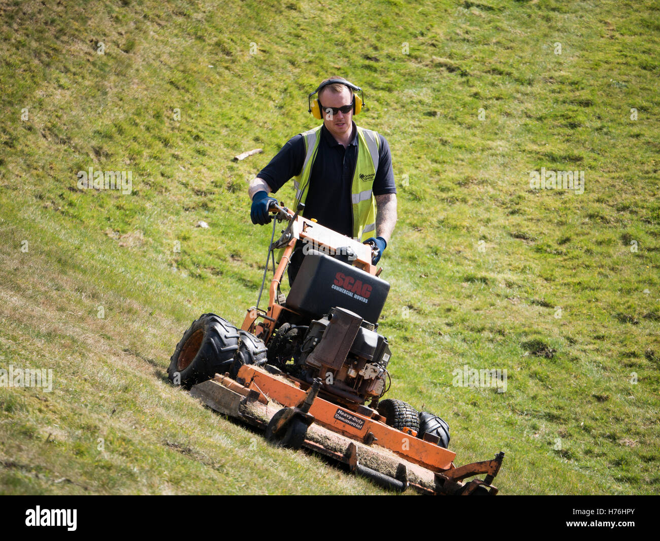 How to safely mow steep slopes