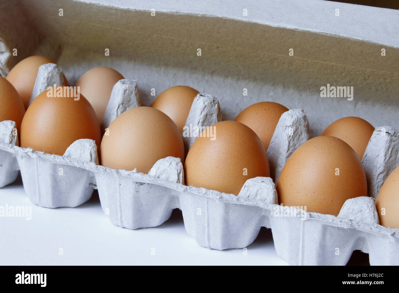 Closeup of eggs in carton Stock Photo
