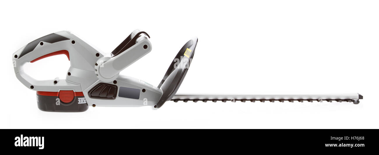 New cordless hedge trimmer isolated on plain background Stock Photo