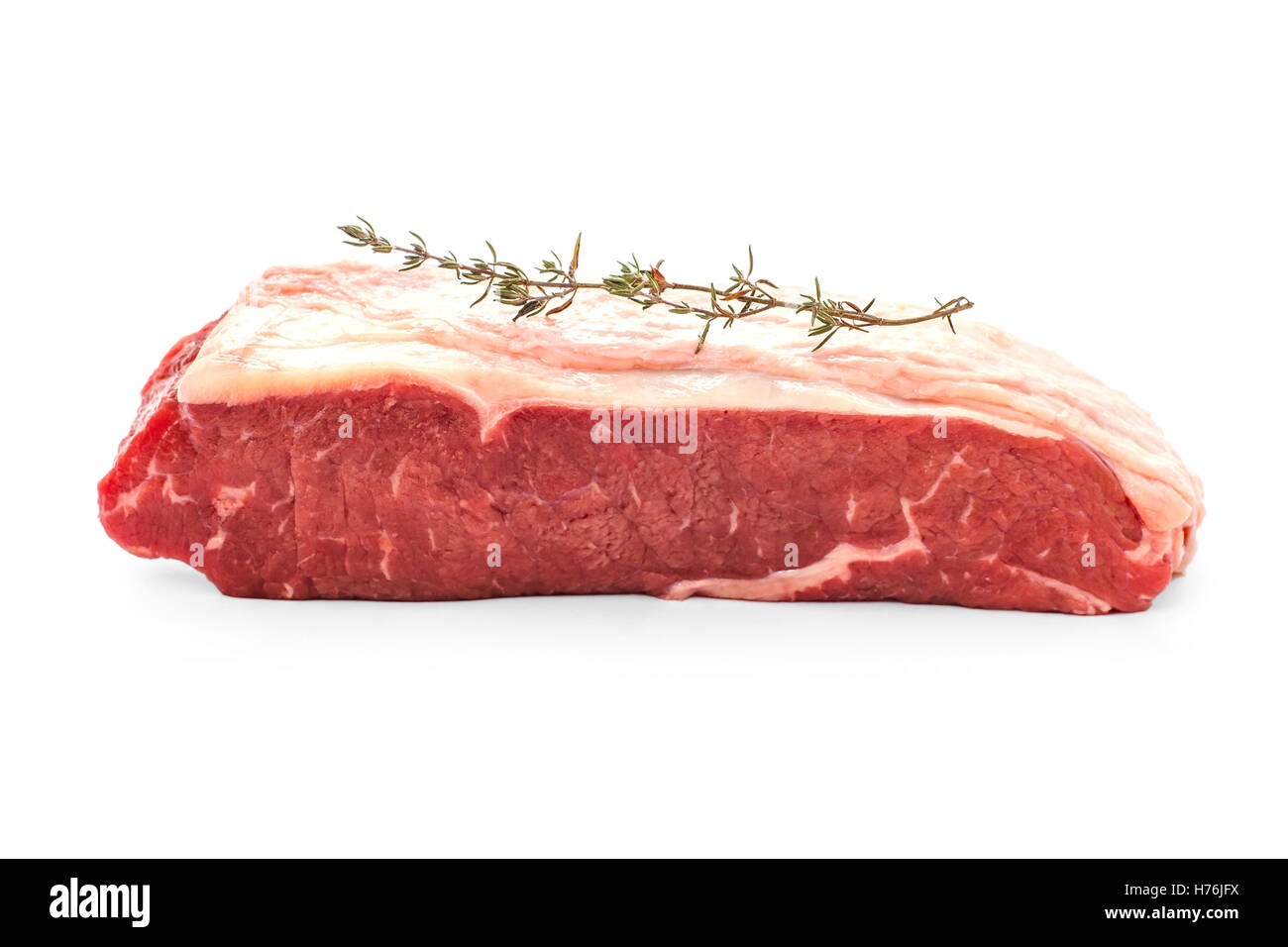 Beef rumpsteak with thyme branch, isolated Stock Photo