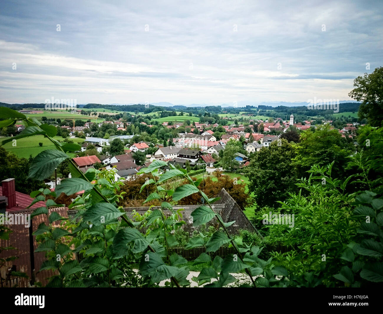 German village in Andechs, Bavaria with view into Alps Stock Photo