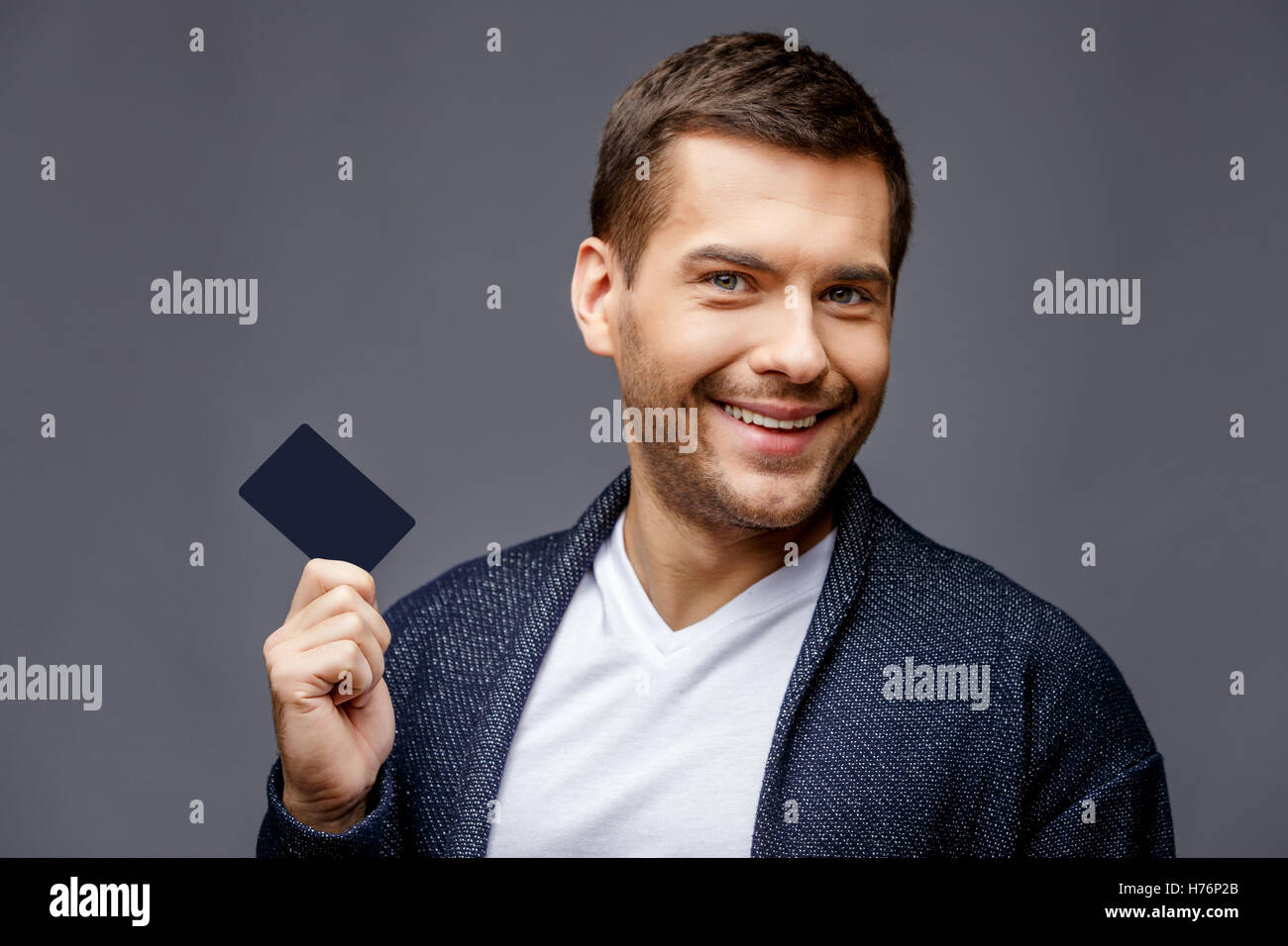 Cheerful young man in smart casual wear Stock Photo