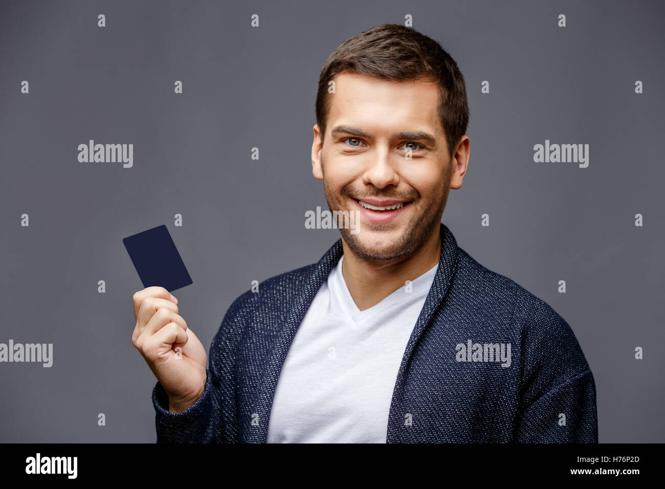 Cheerful young man in smart casual wear Stock Photo