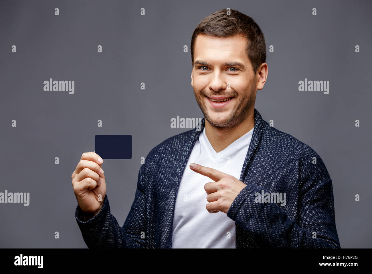 Cheerful young man in smart casual wear Stock Photo - Alamy