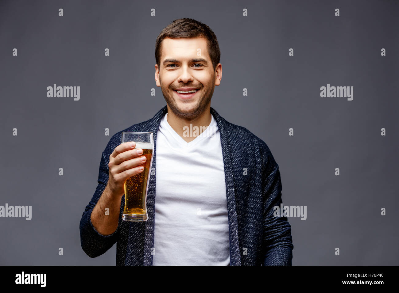 Cheerful young man in smart casual wear Stock Photo - Alamy