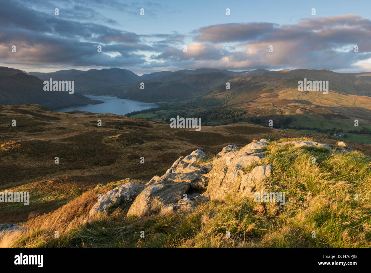 View towards Ullswater from Gowbarrow Fell in dramatic autumn morning light, English Lake District national park, Cumbria, Stock Photo