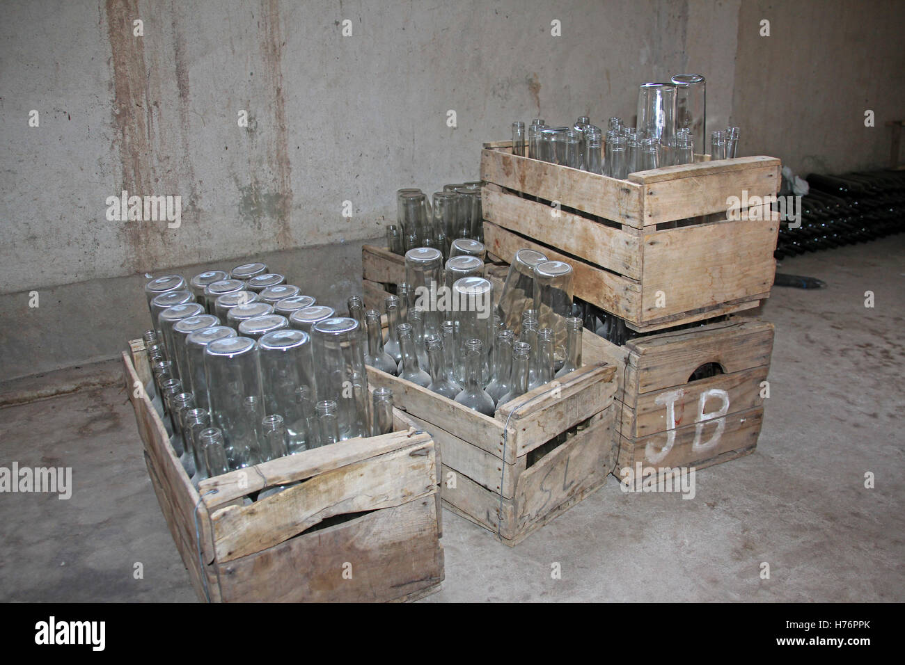 Empty bottles in wooden boxes, ready to be filled, Camargo, Bolivia Stock Photo